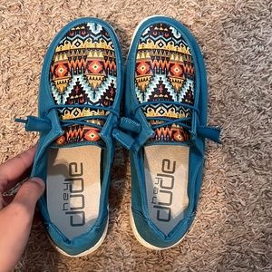 Hey Dude custom made Aztec print. Size 7 women’s. Only worn once.